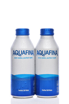 IRVINE, CALIFORNIA - 20 APR 2026: Two aluminum cans of AquaFina purified Still Water.