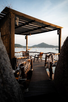 Sunset over a deck on the island of Ko Tao in Thailand.