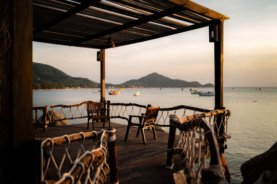Sunset over a deck on the island of Ko Tao in Thailand.