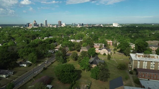 The campus of St Augustine's University, an HBCU in Raleigh, NC with the city skyline in the distance