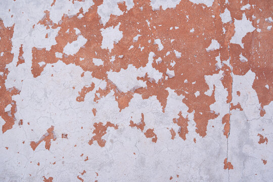 textura de pared descascar&aacute;ndose en color blanco y cobrizo