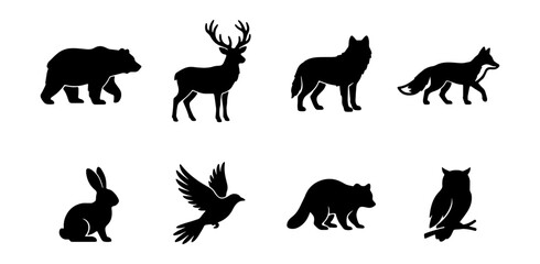 Obraz premium Set of wild forest animal silhouettes, including bear, deer, wolf, fox, rabbit, bird, raccoon, and owl
