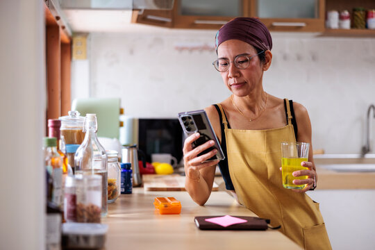 Woman checking social media during daily routine
