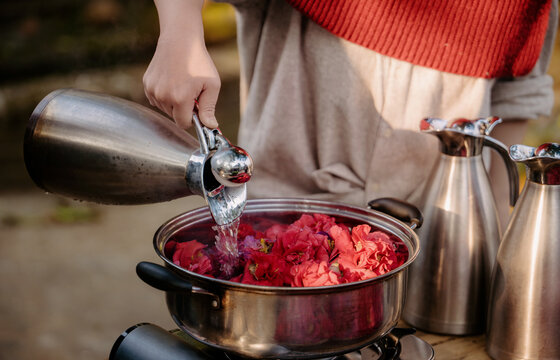 Boiling plant-based tie-dye water, made with fresh flower ingredients
