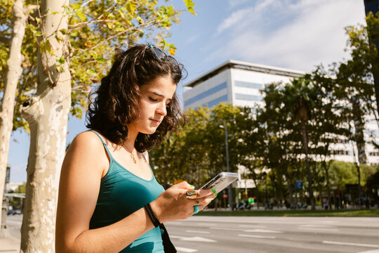 Looks at Her Phone City Sunny