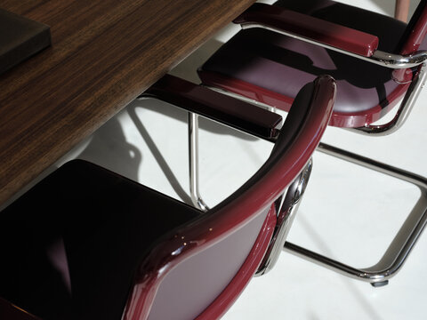 Detail of a meeting room with design armchairs and table