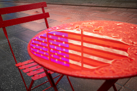American Flag Reflection on Rainy Table