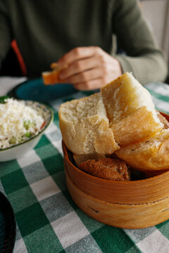 Lunch With Bread and Salad on a Checkered Tablecloth