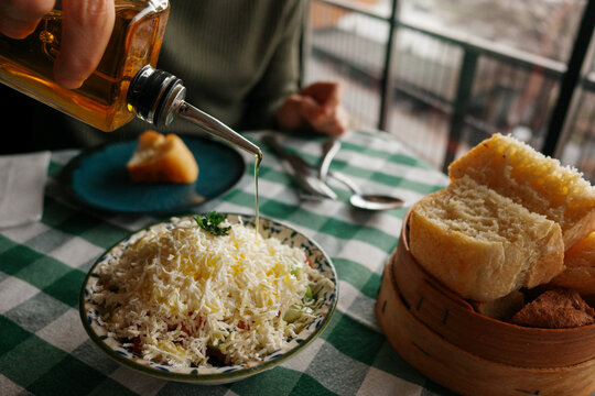 Cozy Dining with Olive Oil and Fresh Bread