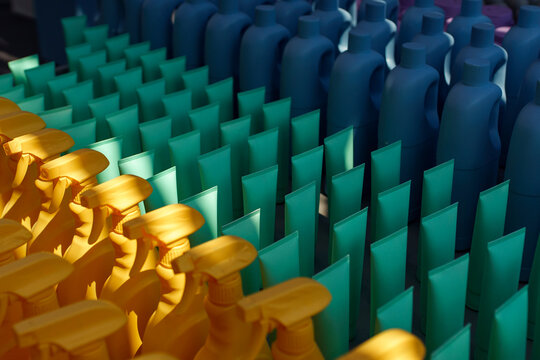 Vibrantly colored cleaning products arranged in an indoor exhibition