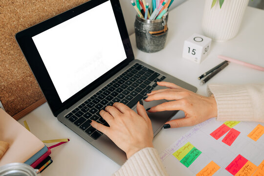 Close Up of Female Hands Typing on Laptop Keyboard