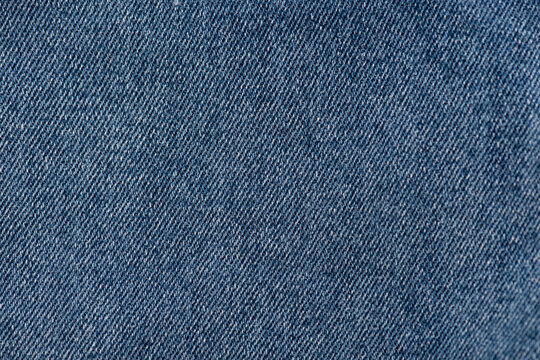 Old blue denim and abstract denim texture pattern background.