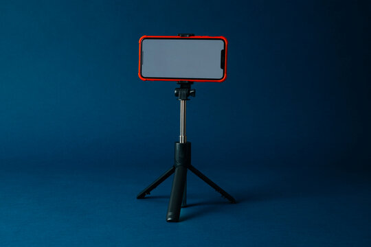 smartphone mounted on a small tripod