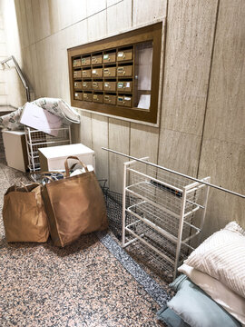 Moving day objects placed inside apartment building entrance