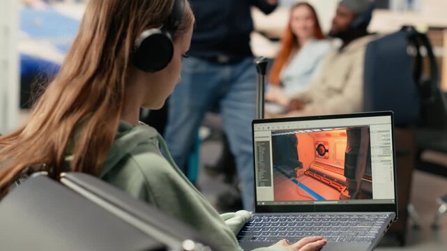 Software engineer creating gaming assets for video game in the airport lounge, remote development work for futuristic spatial design. Digital nomad location independent, global mobility.