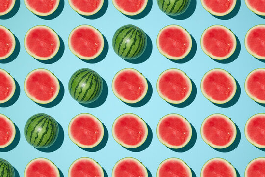 A refreshing and colorful watermelon pattern on a bright blue