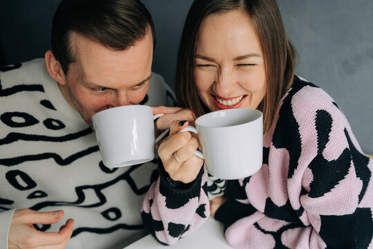Happy Couple Enjoying Morning Tea Together