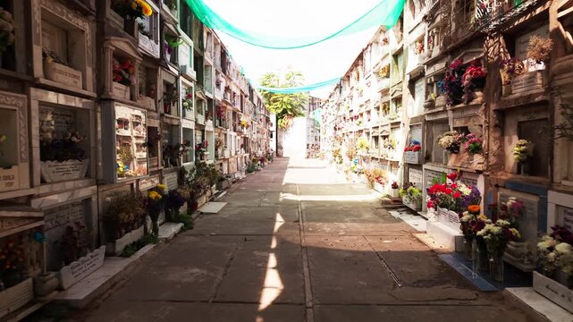 Aerial backward drone shot of a Catholic cemetery parque in Santiago Chile, pulling back to reveal a serene field of tombstones, andcrypts, cinematic 4K b-roll.
