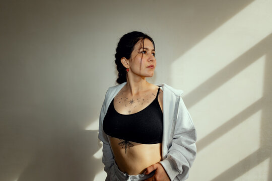 Female boxer standing confidently