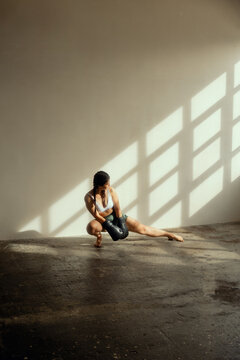 Woman  doing a side leg stretch