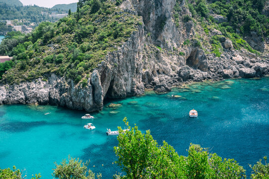 Turquoise Bay with Boats and Limestone Cliffs, Corfu