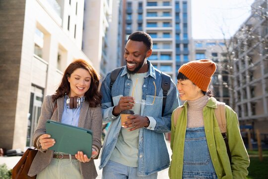 Friends enjoying time together on a city street