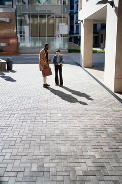 Business meeting in urban setting during daytime