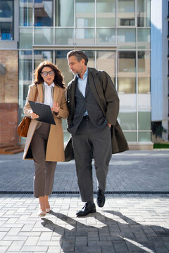 Business meeting in outdoor urban space at daytime