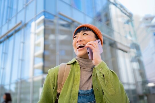 Entrepreneur receiving good news on phone