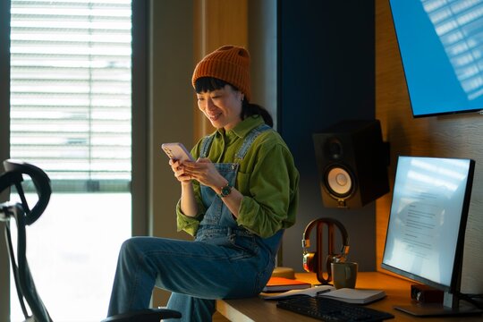 Person using phone while sitting in room