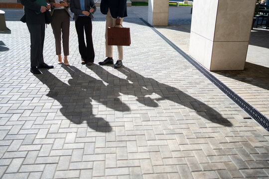 Group of people discussing outside in the city