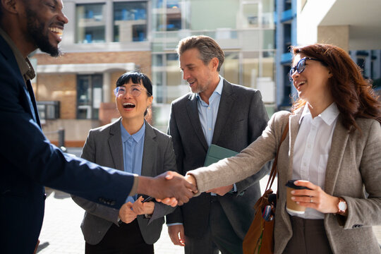 Business people meet and greet in an office area