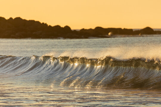 Wave breaking in warm morning light.. Eyre Peninsula. South Australia.