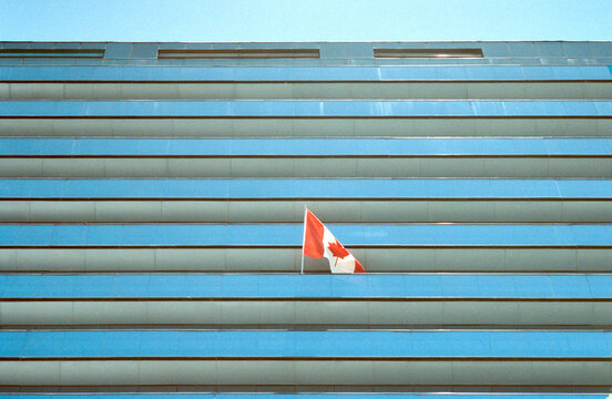 Canadian Flag On Glass