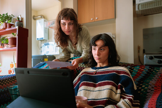 Same Sex Couple Paying Bills Online