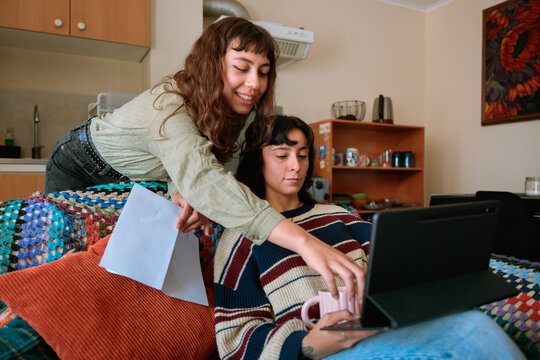Lesbian Couple Paying Bills Together