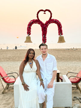 Couple Enjoys Sunset at Beachside in Goa, India 