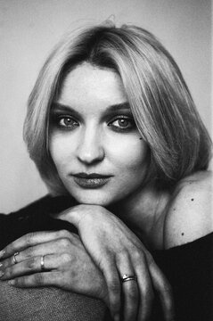 TITLE:
Intense Blonde Close-Up With Rings, B&W Analog Film Portrait