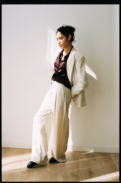 Fashion portrait with sunlight shadows