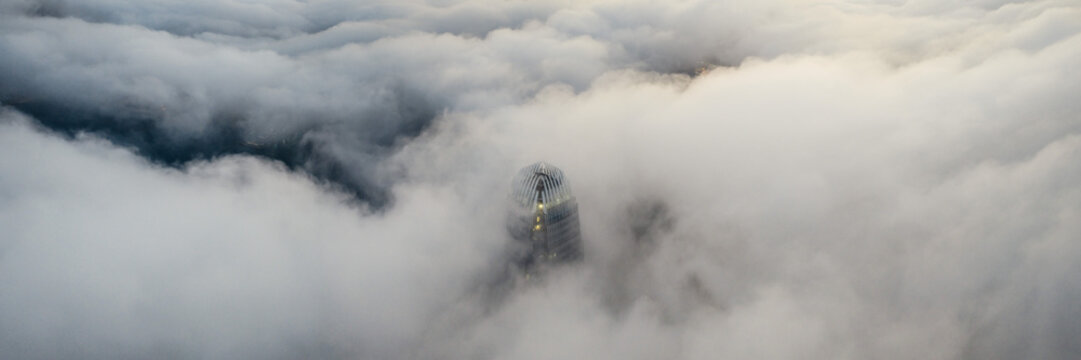 IFC Builing beneath the clouds Hong Kong
