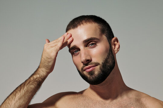 Man hydrating his forehead