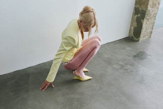 Fashion portrait woman in pastel color outfit