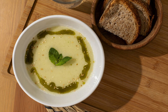 Warm Soup With Herbs and Brown Bread