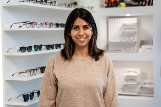 Customer Smiling In Eyewear Store