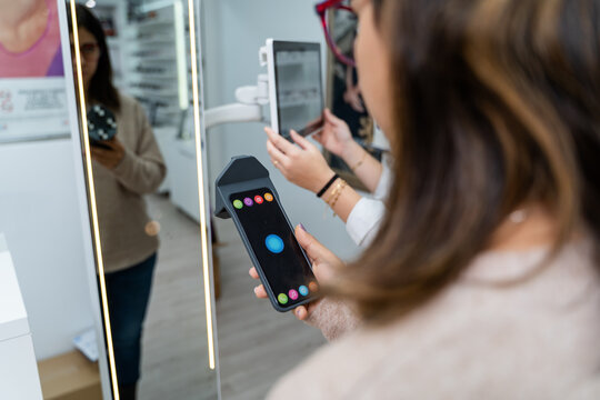 Customer Using Measuring Device