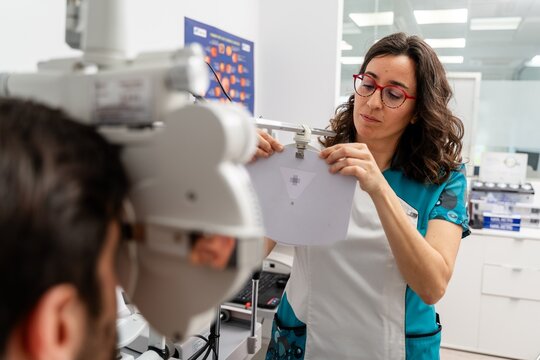 Optometrist Conducting Eye Exam
