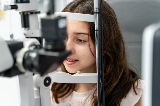 Teen Girl Undergoing Slit Lamp Eye Exam