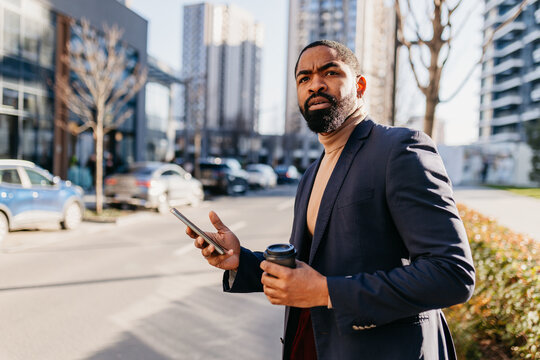 Portrait of a man stands in the street