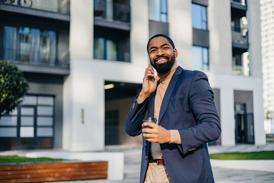 Businessman talks on his phone 