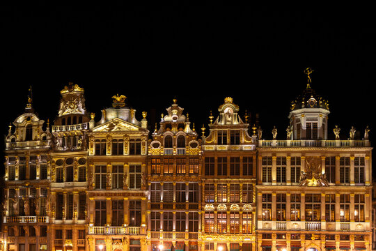 Illuminated Baroque Architecture on a European Street at Night